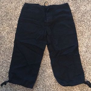 Black Nike Capri shorts.